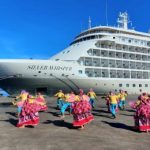 Folk dancers hired by the City Tourism Department welcome the passengers and crew of the luxury cruise ship MS Silver Whisper as it arrives in Puerto Princesa.